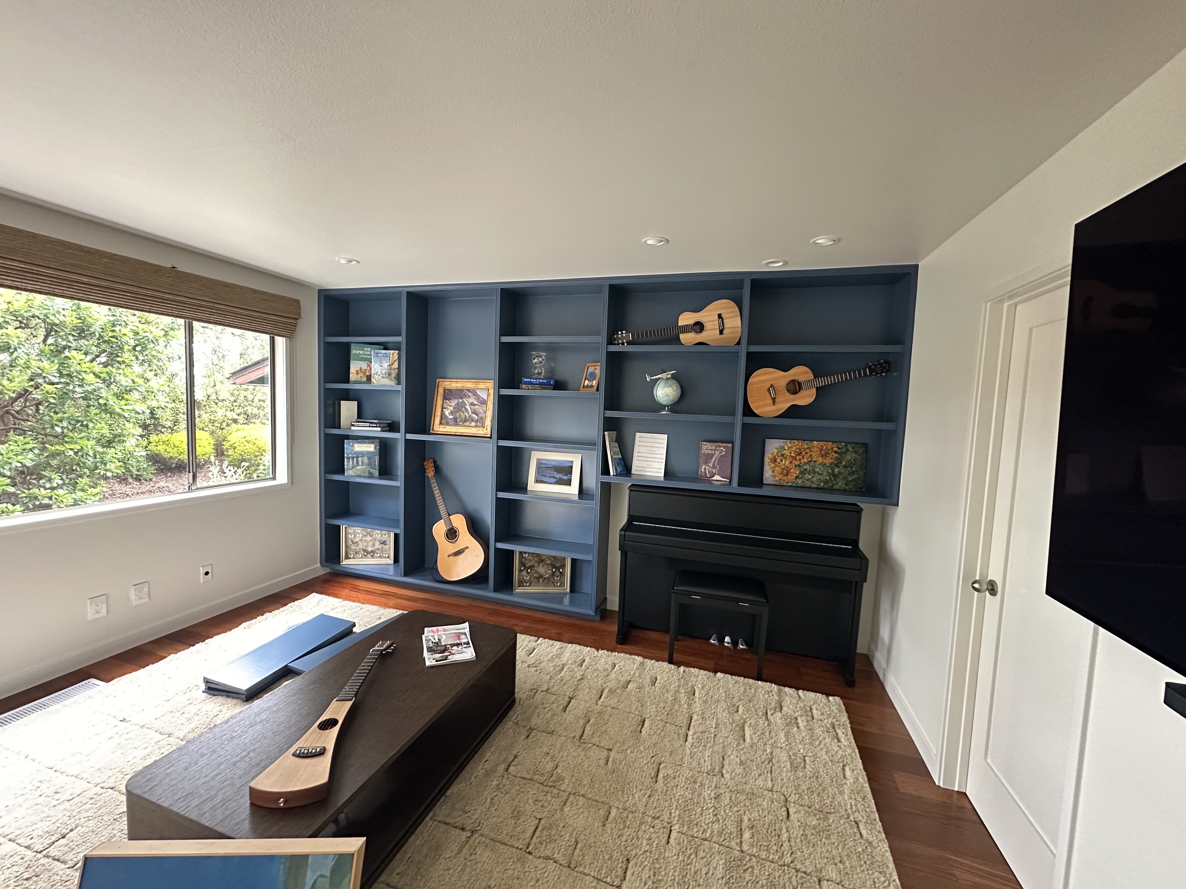 painted shelving with guitars